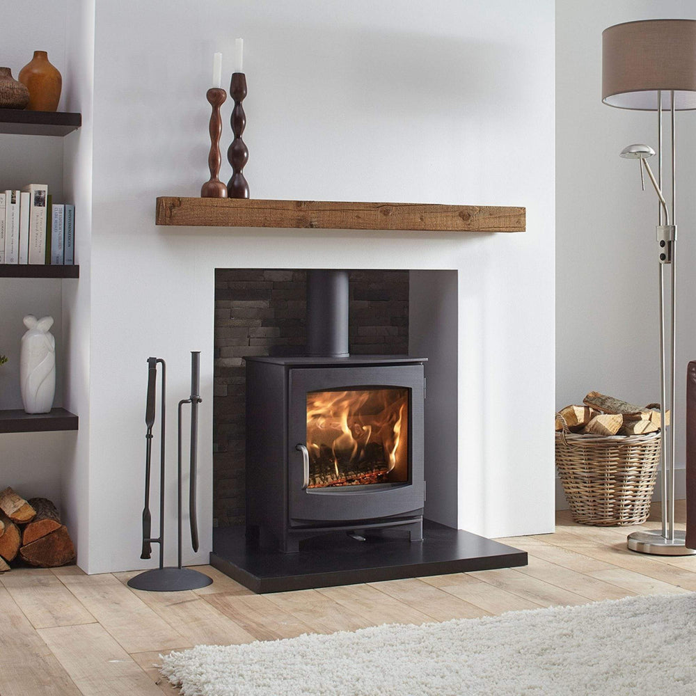 Dik Geurts Ivar 5 stove installed in a fireplace
